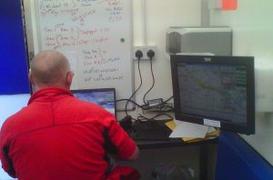 A&SSAR search advisor preparing to brief the SAR incident controller, coordinating the teams on the ground.